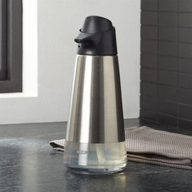OXO Good Grips dispenser on a counter with a modern kitchen aesthetic