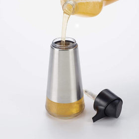 Wide refill opening of the OXO dispenser for quick, clean refills