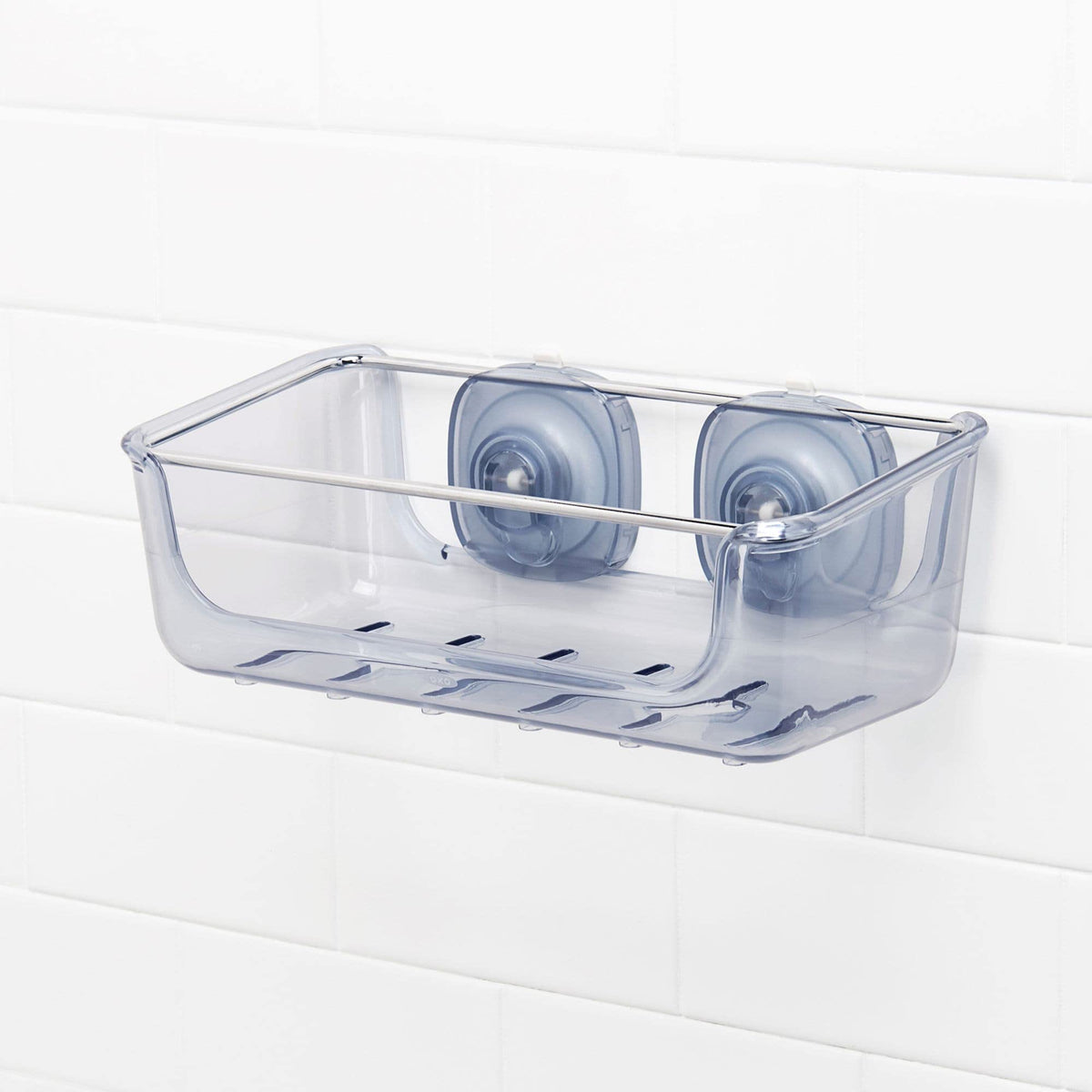 Holds multiple shampoo and liquid soap bottles in one basket.