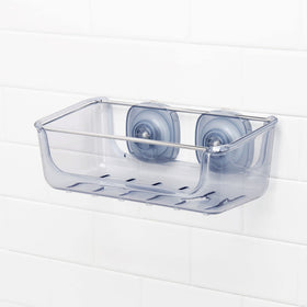 Holds multiple shampoo and liquid soap bottles in one basket.