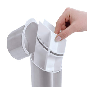 OXO Good Grips organizer holds four brushes for shared bathrooms.