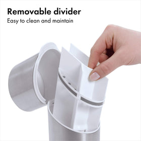 OXO Good Grips toothbrush organizer interior divider keeps heads separate.