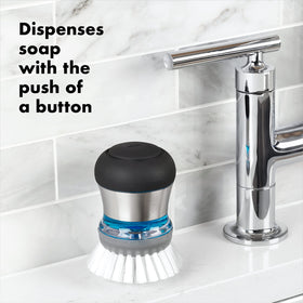 Soft non-slip grip with stainless steel accent improves scrubbing comfort.