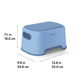 OXO Tot Step Stool Dusk in-use image shows child reaching the sink confidently.
