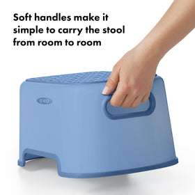 OXO Tot Step Stool Dusk soft handles enable easy transport between rooms.