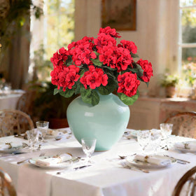 PABREY red faux geraniums add year-round color to garden spaces.