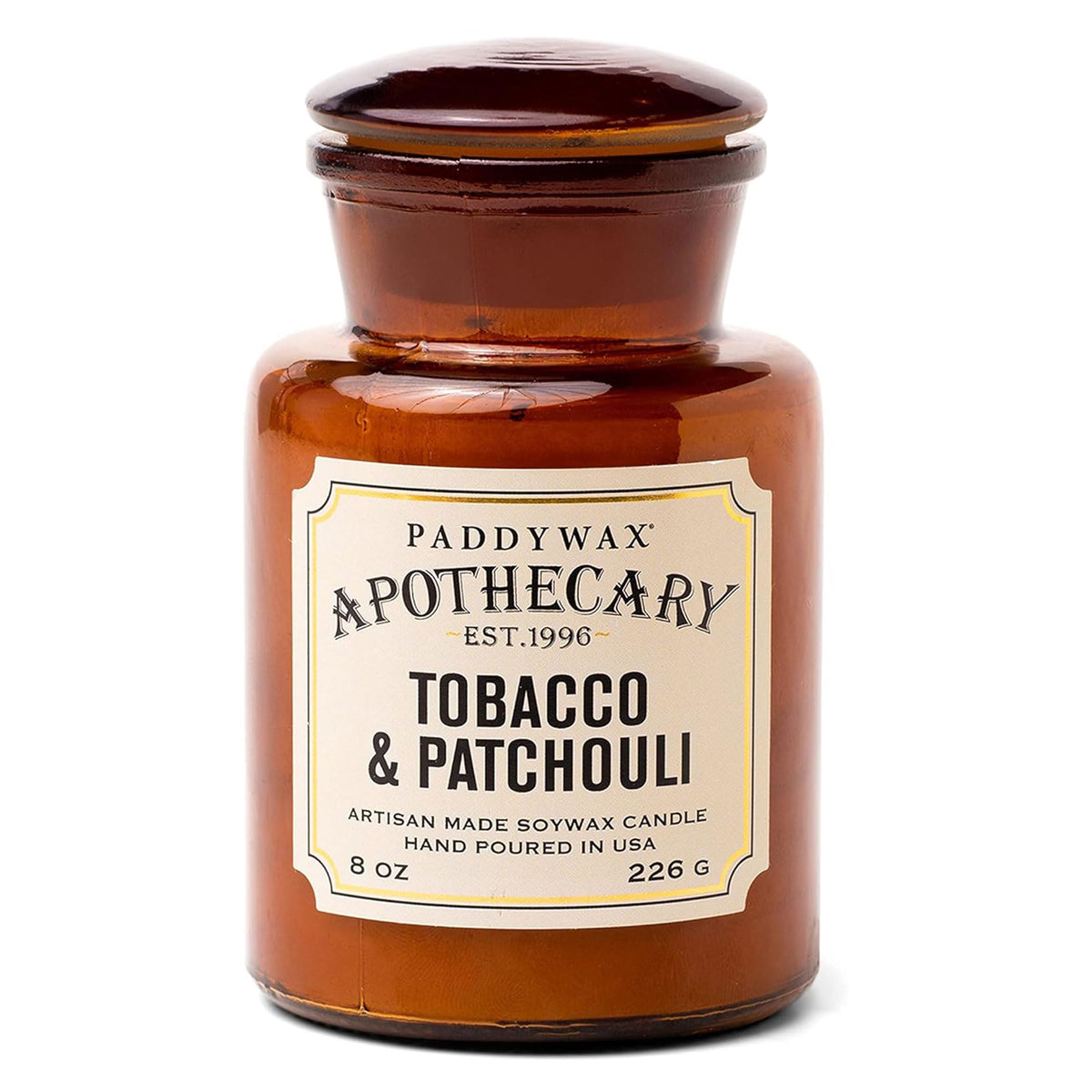 Paddywax Artisan Apothecary candle in reusable glass jar creates warm ambience.