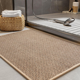 PADOOR non-slip bath mat with rubber backing for stable footing and dry floors.