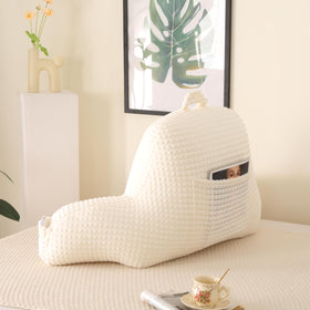 PAJEO Cozy Flannel Reading Pillow vacuum-sealed packaging ready to expand.