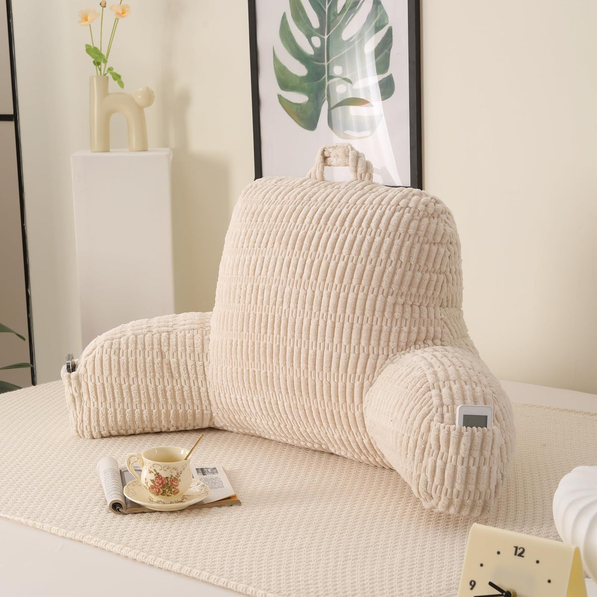 PAJEO Reading Pillow with arm rests for bed reading and lounging.