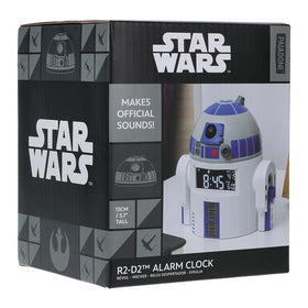 Paladone R2D2 alarm clock on bedside table, perfect decor for Star Wars fans.