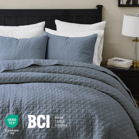 Palassio bedspread draped over bed demonstrates lightweight warmth for all seasons.