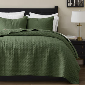 Palassio olive green quilt with queen cover showing textured stitching for durability