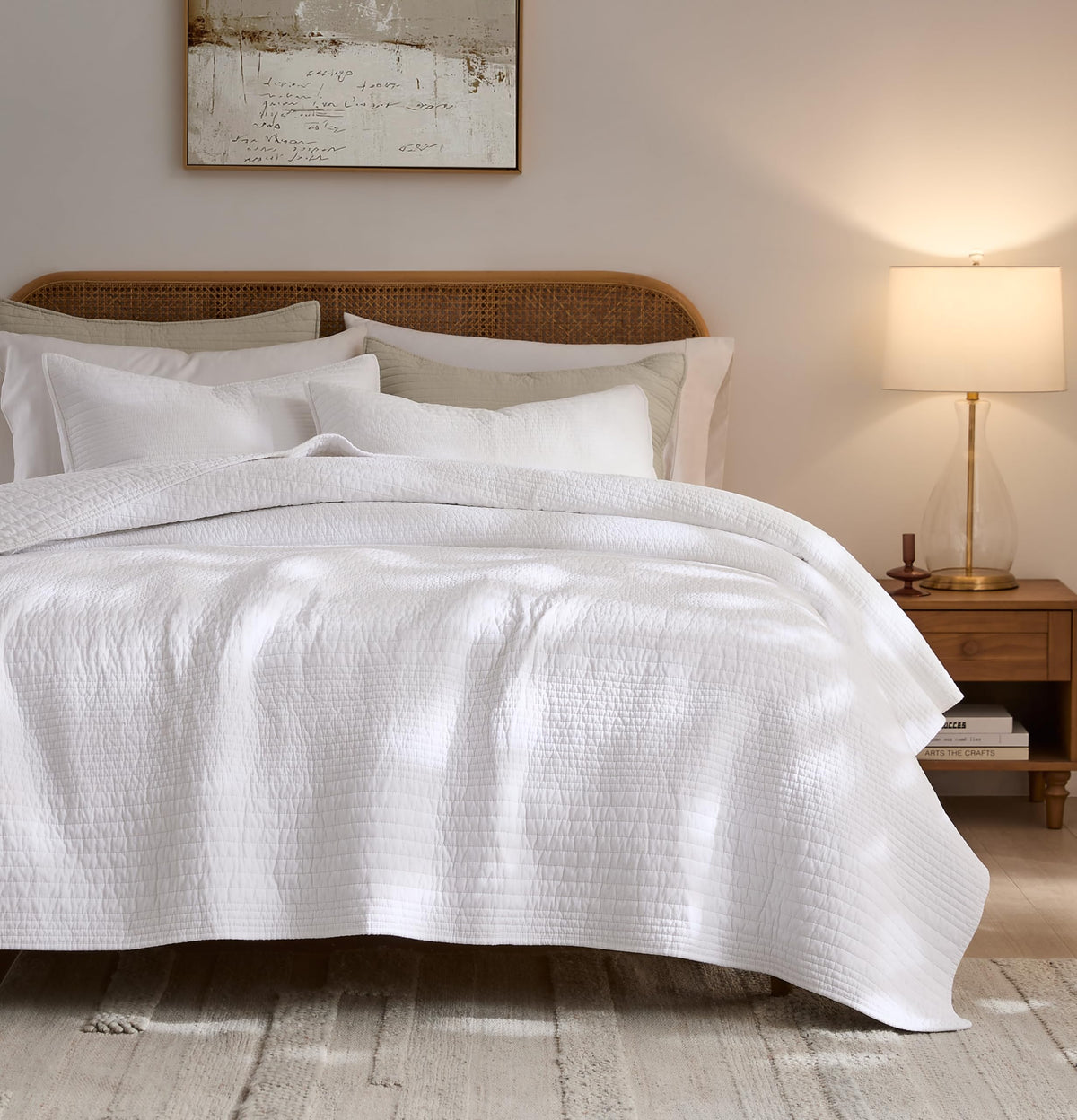 Palassio striped white quilt queen setup for breathable all-season sleep.
