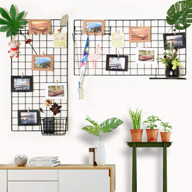 PAMANO photo display grid shows artwork and memories on wall.