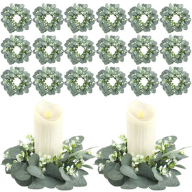 Panelee eucalyptus candle ring close-up texture highlights lifelike leaves for wedding decor and home ambiance.