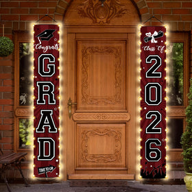 Party Greeting Class of 2026 banners with LED lighting brighten the front door for a festive welcome.