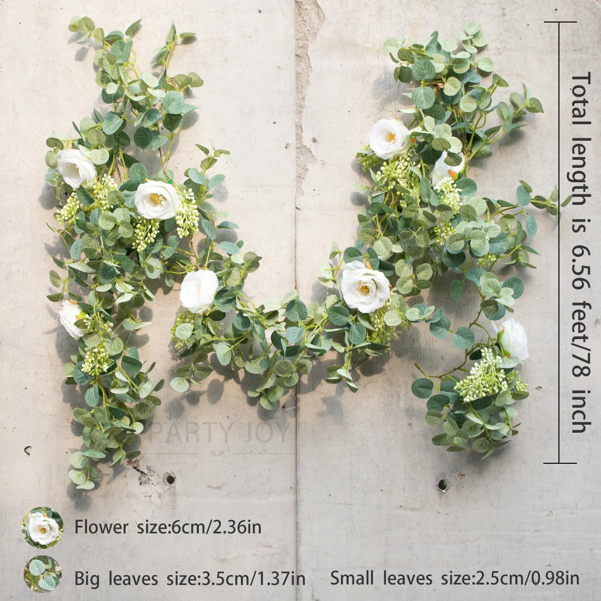 PARTY JOY garland with white roses close-up highlighting detail