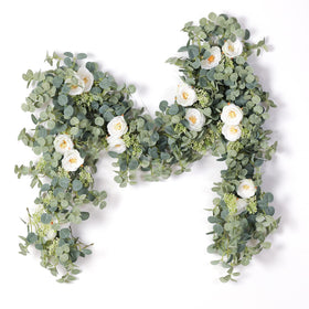PARTY JOY eucalyptus garland two-pack shown in a wide backdrop setup