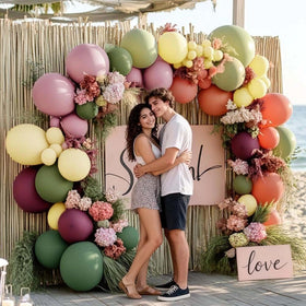 Partycus enchanted forest vibe with sage and mauve tones.