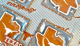 PartyKandy UT Longhorns banner and toppers enhance party photos.