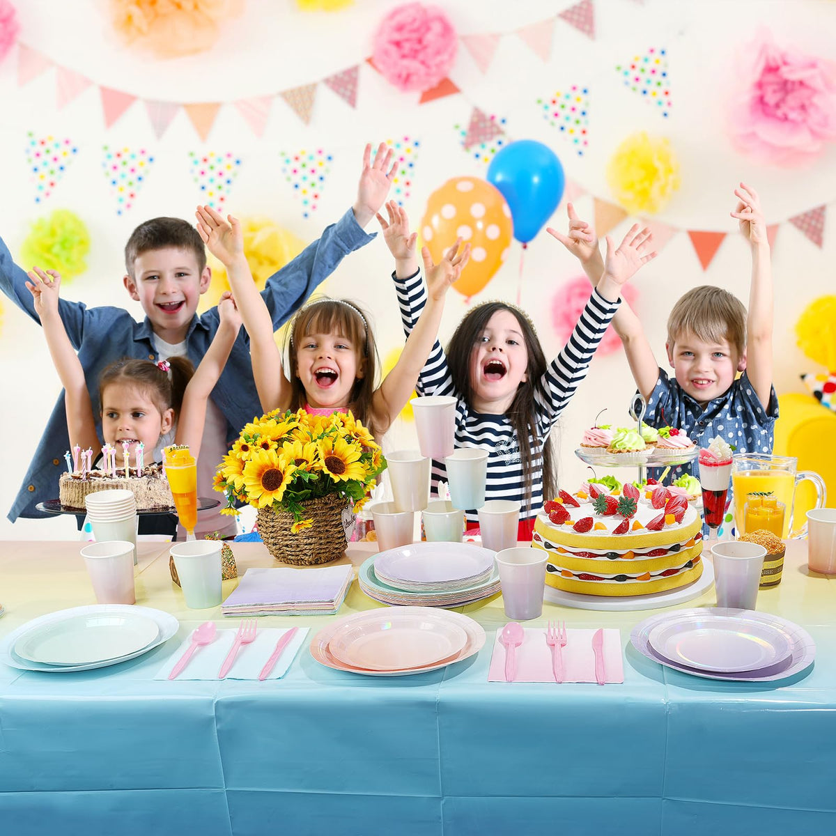 Pascliyna rainbow holographic tableware creates vibrant party ambiance.