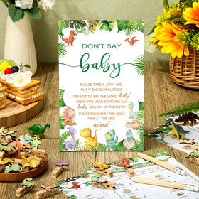Patelai dinosaur baby shower clothespins secure cards for easy play.