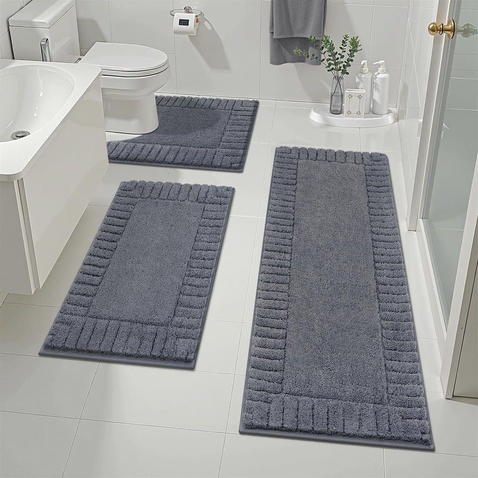 Pauwer 3-piece bathroom rug set on a tile floor offers plush comfort.