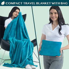 PAVILIA airplane blanket folded into a pillow case for head support