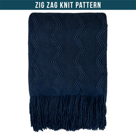 PAVILIA navy blue knit throw draped over bed for layered decor.