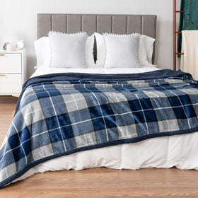 PAVILIA plaid navy sherpa close-up highlighting ultra-soft fleece and cozy texture.