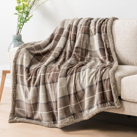 PAVILIA reversible sherpa plaid shows dual textures for decor versatility
