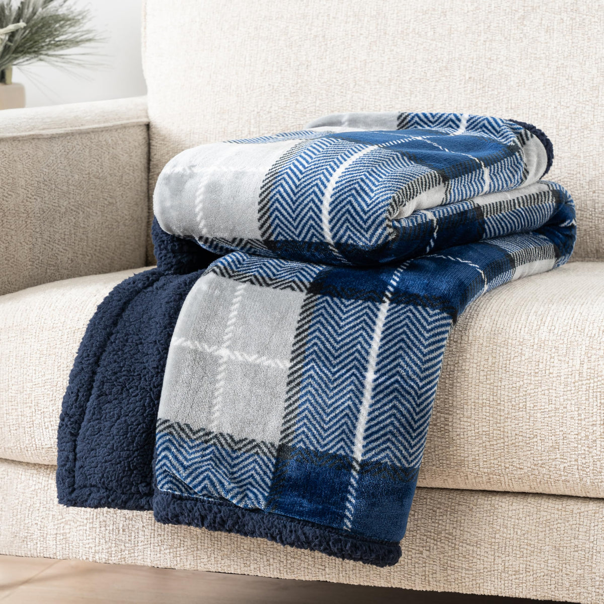 PAVILIA soft-flannel texture close-up with plush sherpa backing.