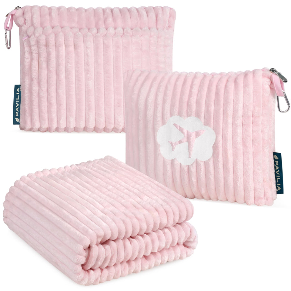 PAVILIA travel blanket folded into pillow for compact packing and soft support