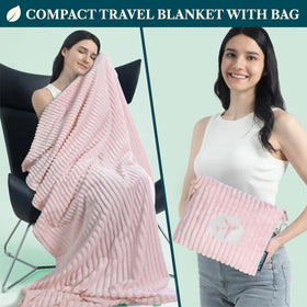 PAVILIA travel blanket packed into its portable bag with strap