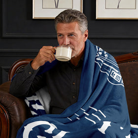 PAZISOL blanket on sofa while watching TV
