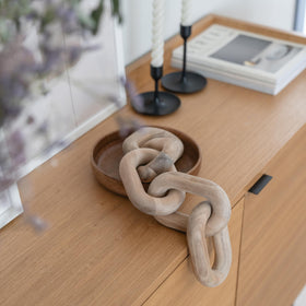 Peakoly acacia wood ornament offering natural lines and warm tones