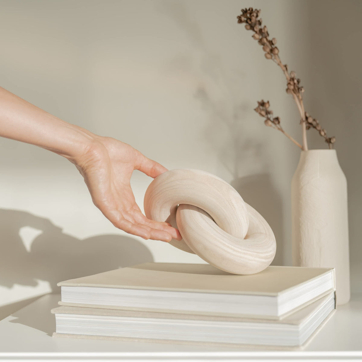 Peakoly beige wood knot decor creates a cozy, neutral space ambiance