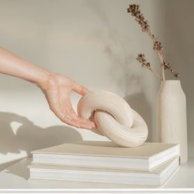 Peakoly beige wood knot decor creates a cozy, neutral space ambiance