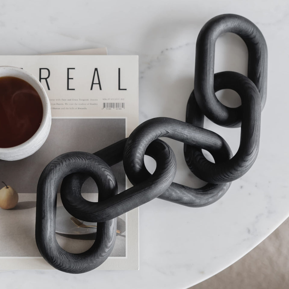 PEAKOLY black chain decor on a coffee table enhances modern living room ambiance