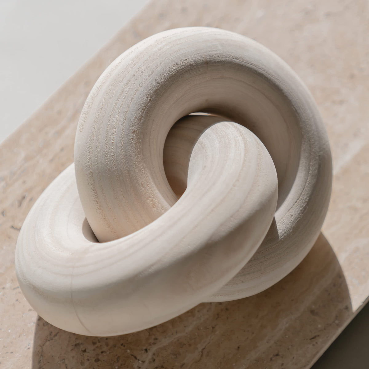 Peakoly wood knot decor natural on a coffee table adding warmth to the living space