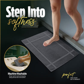 Modern bathroom scene with Pearl Linens dark-grey bath mat.