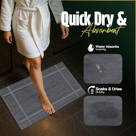 Machine-washable Pearl Linens bath mat shown in clean laundry cycle.