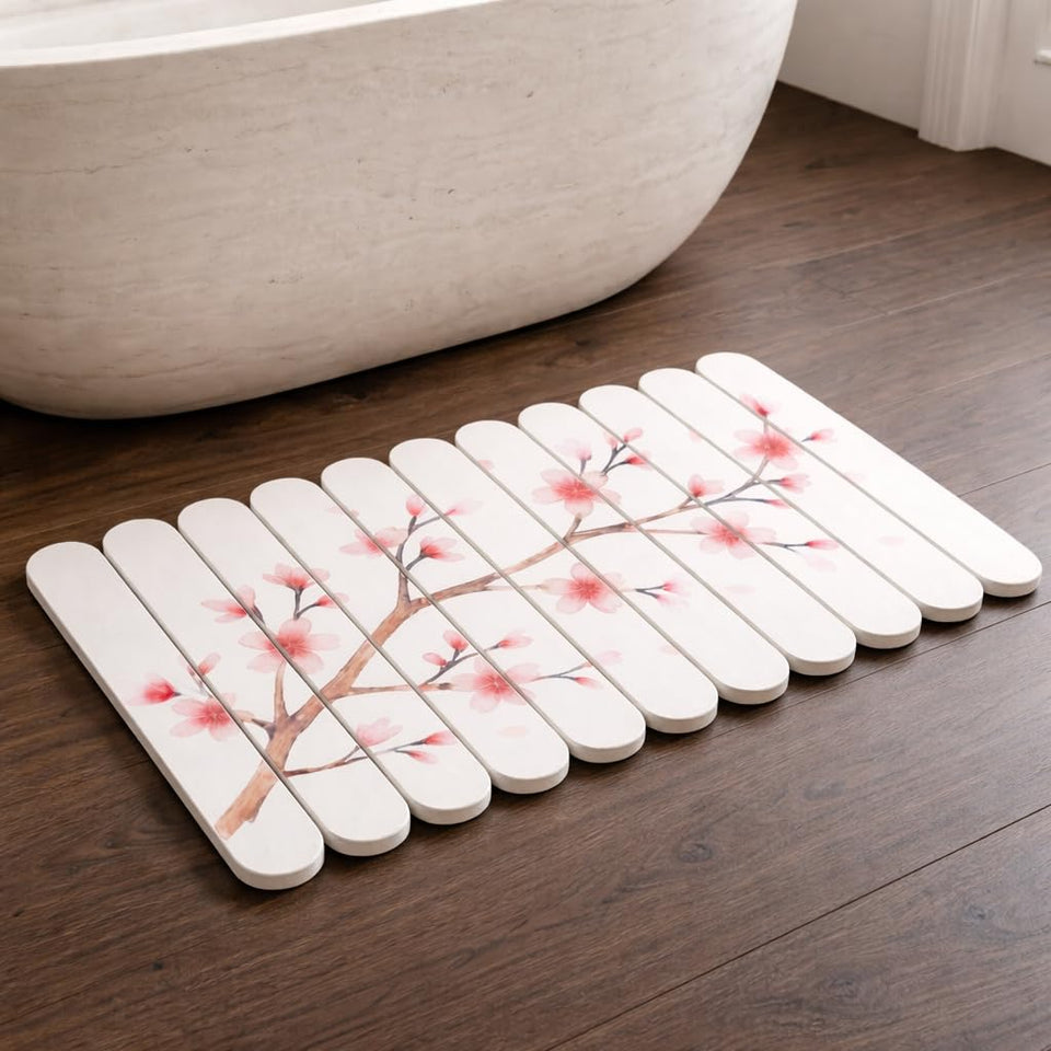 Pebble Nest foldable stone bath mat with quick-dry surface for bathrooms