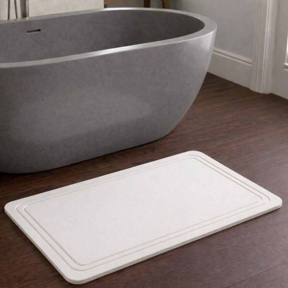 Pebble Nest Stone Bath Mat with diatomite quick-dry surface reduces wet floors