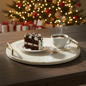 PEMAR tray closeup shows gold handles and refined finish.