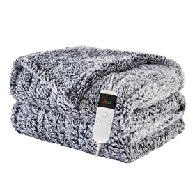 Pengzhu Technology heated blanket on bed offers cozy warmth and plush softness.