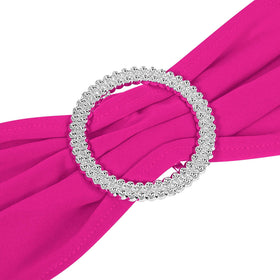 Peomeise wedding chair sash in fuchsia adds vibrant color to event decor.