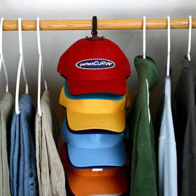 Perfect Curve Cap Rack System 36 wall mount keeps caps organized and accessible.