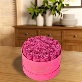Perfectione Roses velvet pink box close-up showing premium preserved roses.